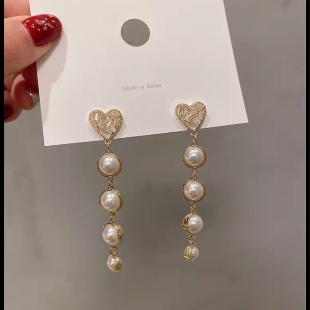 Heart shaped drop earrings ear piercing